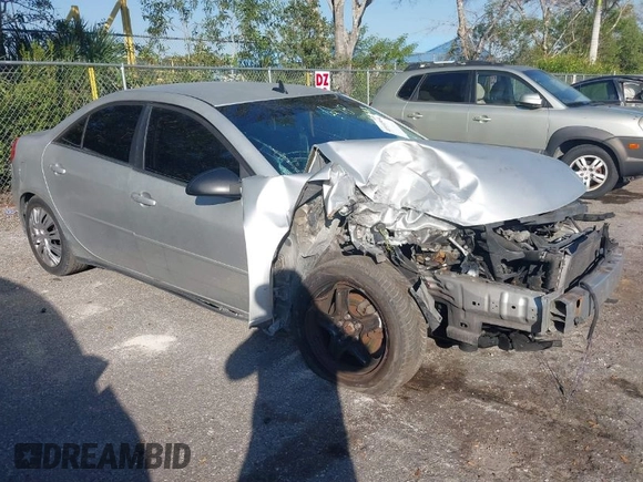 2009 Pontiac G6 w/1SA *Ltd Avail* with VIN 1G2ZG57B594156522, listed as a IAAI auction lot 40931964 with 197,196 mi miles. Bid and sale history available at carsss.com. Image 1.