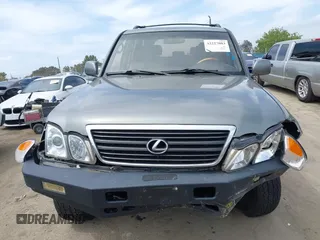 2001 Lexus LX 470 z VIN JTJHT00WX13509489, wystawiony jako IAAI lot #42227083 z przebiegiem 360 283 mil mil oraz . Historia ofert i sprzedaży dostępna na DreamBid. Obrazek 12.