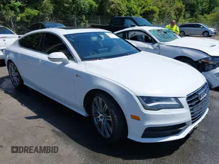 2014 Audi A7 Prestige z VIN WAU2GAFC9EN060846, wystawiony jako IAAI lot #42200592 z przebiegiem 166 250 mil mil oraz . Historia ofert i sprzedaży dostępna na DreamBid. Obrazek 1.