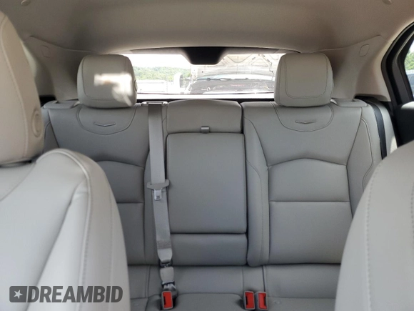 2023 Cadillac XT4 FWD Luxury с VIN 1GYAZAR47PF107473, выставлен на аукционе Copart как лот 59137665 с пробегом 9 198 миль миль и Списание • Salvage title. История ставок и продаж доступна на DreamBid. Изображение 10.