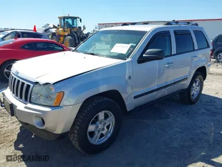 2007 Jeep Grand Cherokee Laredo with VIN 1J8HR48P87C687411, listed as a IAAI auction lot 41774029 with 212,763 mi miles. Bid and sale history available at carsss.com. Image 2.