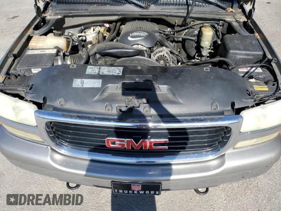2002 GMC Sierra 1500 SLE z VIN 2GTEK19T221377505, wystawiony jako Copart lot #52590575 z przebiegiem 255 933 mil mil oraz Szkoda całkowita • Salvage title. Historia ofert i sprzedaży dostępna na DreamBid. Obrazek 11.