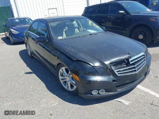 2010 Mercedes-Benz E-Class E 550 Luxury with VIN WDDHF9AB0AA136555, listed as a IAAI auction lot 42069576 with 129,775 mi miles. Bid and sale history available at carsss.com. Image 1.