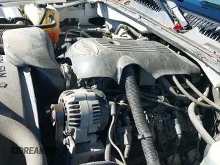 2002 Chevrolet Silverado 1500 LS с VIN 2GCEC19V721217537, выставлен на аукционе IAAI как лот 43465243 с пробегом 210 767 миль миль и . История ставок и продаж доступна на DreamBid. Изображение 19.