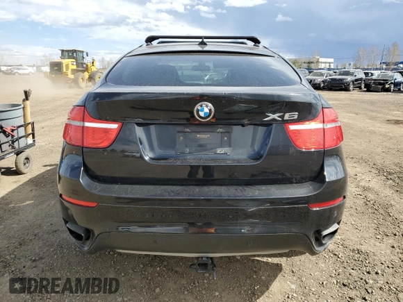2012 BMW X6 50i z VIN 5UXFG8C59CLZ97450, wystawiony jako Copart lot #55281205 z przebiegiem 188 625 mil mil oraz Czysty tytuł • Clean title. Historia ofert i sprzedaży dostępna na DreamBid. Obrazek 6.