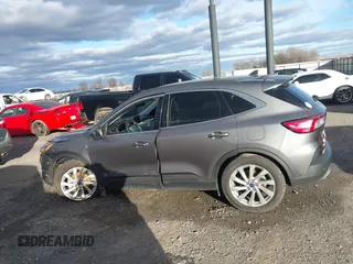 2021 Ford Escape Titanium Hybrid z VIN 1FMCU0DZ0MUB00944, wystawiony jako IAAI lot #41202146 z przebiegiem 52 458 mil mil oraz . Historia ofert i sprzedaży dostępna na DreamBid. Obrazek 14.