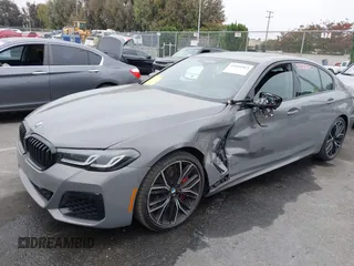 2022 BMW 5 Series M550i xDrive with VIN WBA13BK07NCL07995, listed as a IAAI auction lot 42454963 with 12,721 mi miles and . Bid and sale history available at DreamBid. Image 2.