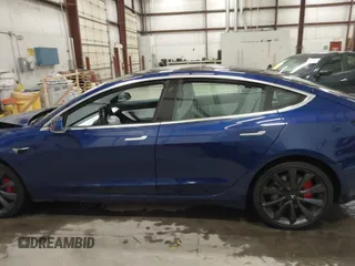 2020 Tesla Model 3 Performance z VIN 5YJ3E1EC7LF641885, wystawiony jako IAAI lot #41372794 z przebiegiem Nie podano mil oraz . Historia ofert i sprzedaży dostępna na DreamBid. Obrazek 13.