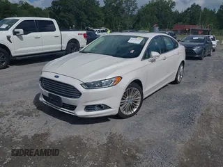 2013 Ford Fusion SE with VIN 3FA6P0HR4DR188994, listed as a IAAI auction lot 42758067 with 98,152 mi miles and . Bid and sale history available at DreamBid. Image 2.