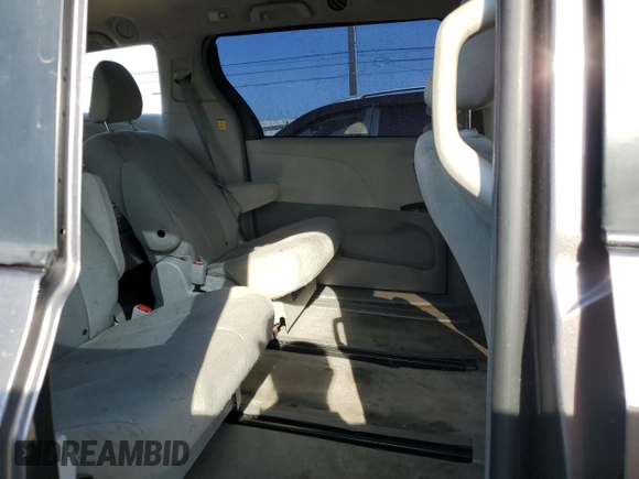 2012 Toyota Sienna with VIN 5TDZK3DC6CS180125, listed as a Copart auction lot 49168735 with 177,951 mi miles and Salvage title. Bid and sale history available at DreamBid. Image 11.