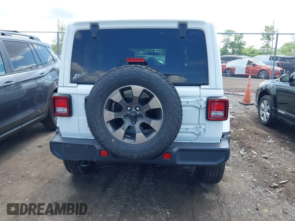 2018 Jeep Wrangler Unlimited Sahara with VIN 1C4HJXEG1JW205789, listed as a IAAI auction lot 42435877 with 57,587 mi miles and . Bid and sale history available at DreamBid. Image 17.