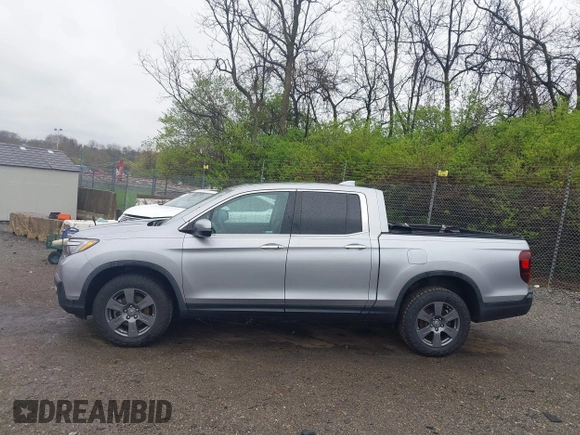 2020 Honda Ridgeline RTL-E with VIN 5FPYK3F73LB004365, listed as a IAAI auction lot 41965887 with 80,981 mi miles and . Bid and sale history available at DreamBid. Image 14.