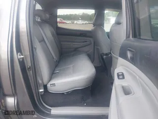 2014 Toyota Tacoma with VIN 5TFLU4EN9EX099414, listed as a IAAI auction lot 40528514 with 122,827 mi miles. Bid and sale history available at carsss.com. Image 8.