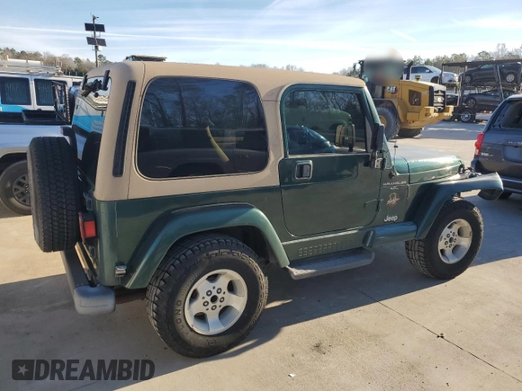 2000 Jeep Wrangler Sahara with VIN 1J4FA59S0YP795198, listed as a Copart auction lot 87920205 with 150,148 mi miles and Salvage Title. Bid and sale history available at carsss.com. Image 3.