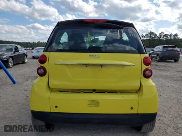 2010 Smart fortwo Pure z VIN WMEEJ3BAXAK371054, wystawiony jako Copart lot #71819294 z przebiegiem 103 177 mil mil oraz Szkoda całkowita • Salvage title. Historia ofert i sprzedaży dostępna na DreamBid. Obrazek 6.