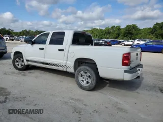 2006 Dodge Dakota SLT with VIN 1D7HE48N46S605282, listed as a Copart auction lot 52635085 with 275,039 mi miles and Salvage Title. Bid and sale history available at DreamBid. Image 2.