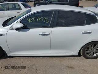 2016 Kia Optima LX Turbo with VIN 5XXGT4L10GG037107, listed as a IAAI auction lot 42071593 with 152,919 mi miles. Bid and sale history available at carsss.com. Image 14.