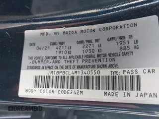 2021 Mazda 3 Preferred with VIN JM1BPBCL4M1340550, listed as a IAAI auction lot 42084363 with 46,240 mi miles and . Bid and sale history available at DreamBid. Image 9.