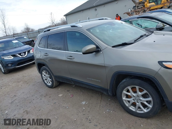2016 Jeep Cherokee Latitude with VIN 1C4PJLCS4GW347218, listed as a IAAI auction lot 41651285 with 95,169 mi miles. Bid and sale history available at carsss.com. Image 12.