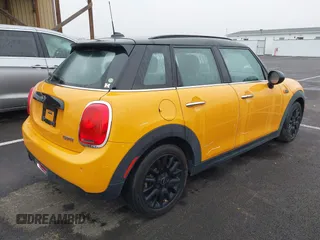 2018 MINI Hardtop 4 Door Cooper with VIN WMWXU1C59J2F79169, listed as a IAAI auction lot 40973679 with 97,507 mi miles and . Bid and sale history available at DreamBid. Image 4.
