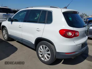 2011 Volkswagen Tiguan SEL with VIN WVGBV7AXXBW554267, listed as a IAAI auction lot 42773354 with 70,547 mi miles and . Bid and sale history available at DreamBid. Image 3.