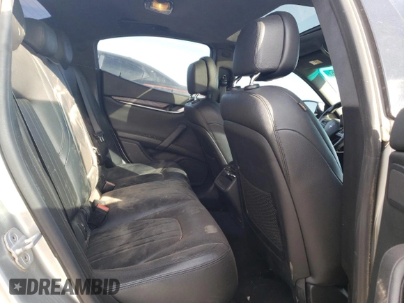 2014 Maserati Ghibli z VIN ZAM57XSA3E1105712, wystawiony jako Copart lot #47751435 z przebiegiem 88 432 mil mil oraz Szkoda całkowita • Salvage title. Historia ofert i sprzedaży dostępna na DreamBid. Obrazek 10.