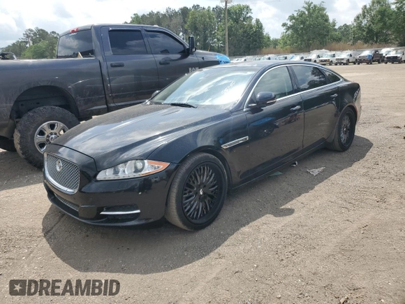 2015 Jaguar XJ with VIN SAJWA2GZXF8V88962, listed as a Copart auction lot 53919035 with 129,987 mi miles and Salvage Title. Bid and sale history available at carsss.com. Image 1.