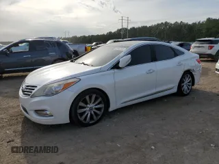 2014 Hyundai Azera Limited z VIN KMHFH4JG3EA352749, wystawiony jako Copart lot #55457525 z przebiegiem Nie podano mil oraz Szkoda całkowita • Salvage title. Historia ofert i sprzedaży dostępna na DreamBid. Obrazek 1.