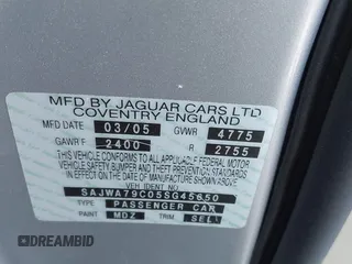 2005 Jaguar XJ with VIN SAJWA79C05SG45650, listed as a IAAI auction lot 41262315 with 76,127 mi miles. Bid and sale history available at carsss.com. Image 9.