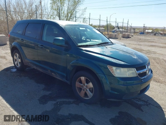 2009 Dodge Journey SXT with VIN 3D4GG57V09T170094, listed as a IAAI auction lot 41867577 with 122,831 mi miles. Bid and sale history available at carsss.com. Image 1.