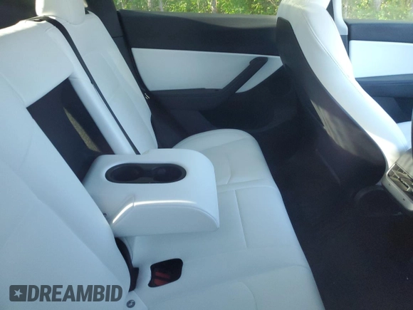 2022 Tesla Model Y Performance with VIN 7SAYGDEF3NF516349, listed as a Copart auction lot 63759245 with Not provided miles and Salvage title. Bid and sale history available at DreamBid. Image 11.
