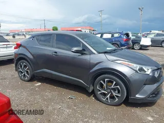 2018 Toyota C-HR XLE with VIN NMTKHMBX6JR021855, listed as a IAAI auction lot 42158449 with 140,945 mi miles and . Bid and sale history available at DreamBid. Image 13.