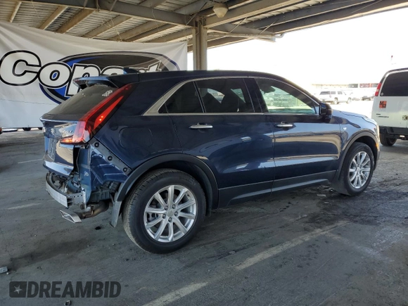 2022 Cadillac XT4 FWD Luxury с VIN 1GYAZAR40NF120224, выставлен на аукционе Copart как лот 61100285 с пробегом 35 260 миль миль и Списание • Salvage title. История ставок и продаж доступна на DreamBid. Изображение 3.