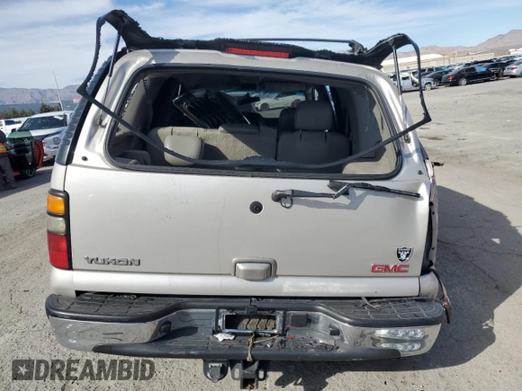 2004 GMC Yukon SLT z VIN 1GKEC13Z84J297911, wystawiony jako Copart lot #48617955 z przebiegiem 173 004 mil mil oraz Szkoda całkowita • Salvage title. Historia ofert i sprzedaży dostępna na DreamBid. Obrazek 6.