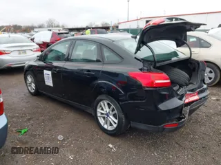 2016 Ford Focus SE with VIN 1FADP3F23GL280843, listed as a IAAI auction lot 41917538 with 125,392 mi miles. Bid and sale history available at carsss.com. Image 3.