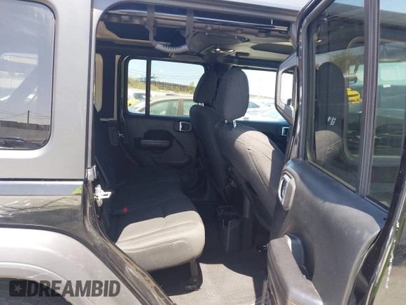 2020 Jeep Wrangler Unlimited Freedom with VIN 1C4HJXDG0LW238819, listed as a IAAI auction lot 42139357 with 67,619 mi miles and . Bid and sale history available at DreamBid. Image 8.