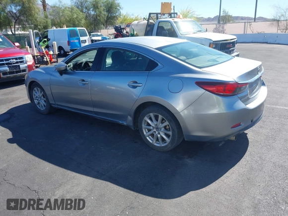 2014 Mazda 6 i Sport with VIN JM1GJ1U61E1151348, listed as a IAAI auction lot 42248173 with 275,764 mi miles and . Bid and sale history available at DreamBid. Image 3.