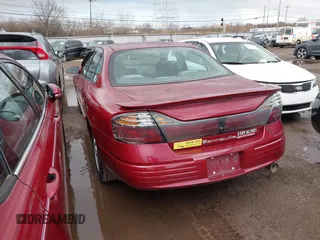2003 Pontiac Bonneville SE with VIN 1G2HX52KX34189218, listed as a IAAI auction lot 41712101 with 131,351 mi miles and . Bid and sale history available at DreamBid. Image 3.