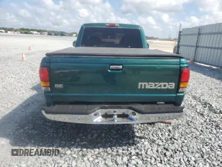 1999 Mazda B-Series Truck SX z VIN 4F4YR12CXXTM34917, wystawiony jako Copart lot #50821635 z przebiegiem 121 165 mil mil oraz Szkoda całkowita • Salvage title. Historia ofert i sprzedaży dostępna na DreamBid. Obrazek 6.