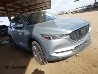 2017 Mazda CX-5 Grand Touring with VIN JM3KFADL3H0121772, listed as a IAAI auction lot 41935183 with 48,869 mi miles and . Bid and sale history available at carsss.com. Image 1.