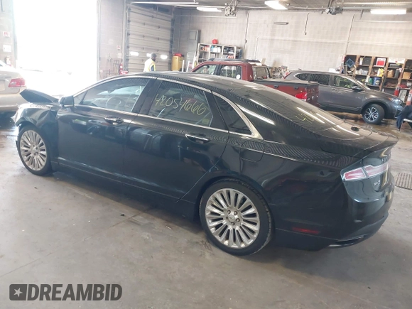 2013 Lincoln MKZ z VIN 3LN6L2G94DR823887, wystawiony jako IAAI lot #42054666 z przebiegiem 101 866 mil mil oraz . Historia ofert i sprzedaży dostępna na DreamBid. Obrazek 3.
