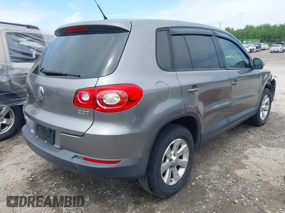 2010 Volkswagen Tiguan with VIN WVGCV7AX9AW515432, listed as a IAAI auction lot 42105962 with 91,405 mi miles and . Bid and sale history available at DreamBid. Image 4.