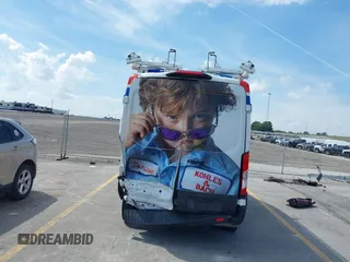 2023 Ford Transit Cargo with VIN 1FTBR1C80PKA43077, listed as a IAAI auction lot 40182475 with 15,656 mi miles and . Bid and sale history available at DreamBid. Image 17.
