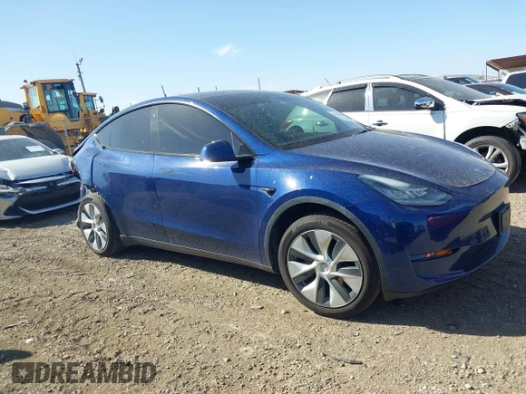 2021 Tesla Model Y Standard Range z VIN 5YJYGDED6MF107711, wystawiony jako IAAI lot #41794384 z przebiegiem 86 934 mil mil oraz . Historia ofert i sprzedaży dostępna na DreamBid. Obrazek 13.