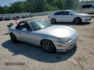1999 Mazda MX-5 Miata z VIN JM1NB3538X0112611, wystawiony jako Copart lot #54732095 z przebiegiem 173 763 mil mil oraz Szkoda całkowita • Salvage title. Historia ofert i sprzedaży dostępna na DreamBid. Obrazek 13.