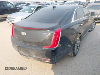 2019 Cadillac XTS Luxury with VIN 2G61M5S38K9100792, listed as a IAAI auction lot 41676187 with 103,056 mi miles and . Bid and sale history available at DreamBid. Image 4.
