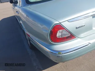2004 Jaguar XJ 8 with VIN SAJEA71CX4SG10751, listed as a IAAI auction lot 42149348 with 89,786 mi miles and . Bid and sale history available at DreamBid. Image 6.
