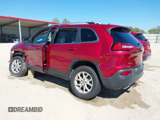 2015 Jeep Cherokee North with VIN 1C4PJMCSXFW654090, listed as a IAAI auction lot 41844434 with 198,592 mi miles. Bid and sale history available at carsss.com. Image 3.