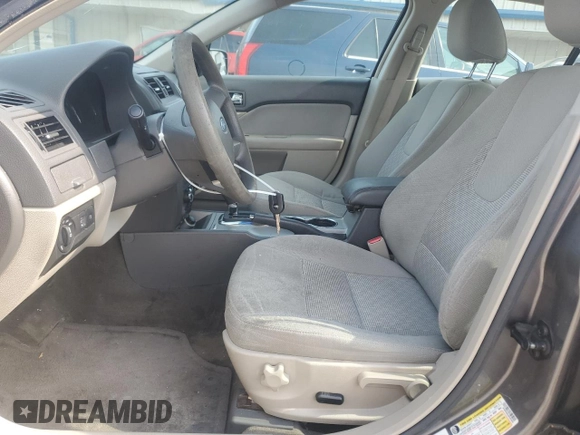 2010 Ford Fusion SE z VIN 3FAHP0HA2AR364858, wystawiony jako Copart lot #60855075 z przebiegiem 184 403 mil mil oraz Szkoda całkowita • Salvage title. Historia ofert i sprzedaży dostępna na DreamBid. Obrazek 7.