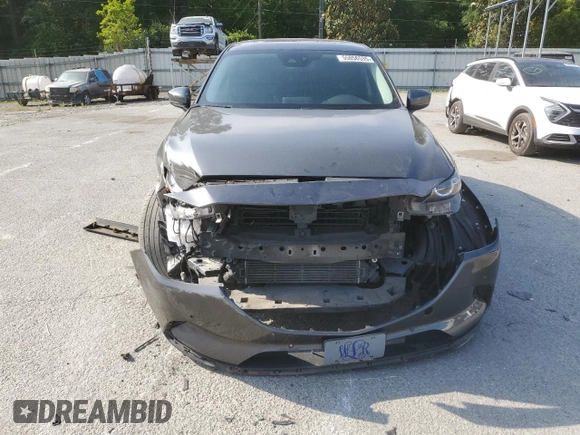 2019 Mazda CX-9 Touring z VIN JM3TCBCY3K0304323, wystawiony jako Copart lot #55056535 z przebiegiem 198 894 mil mil oraz Szkoda całkowita • Salvage title. Historia ofert i sprzedaży dostępna na DreamBid. Obrazek 5.
